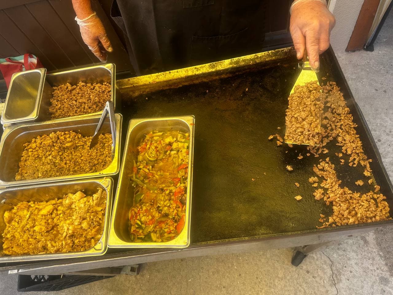 Meats cooking on the plancha